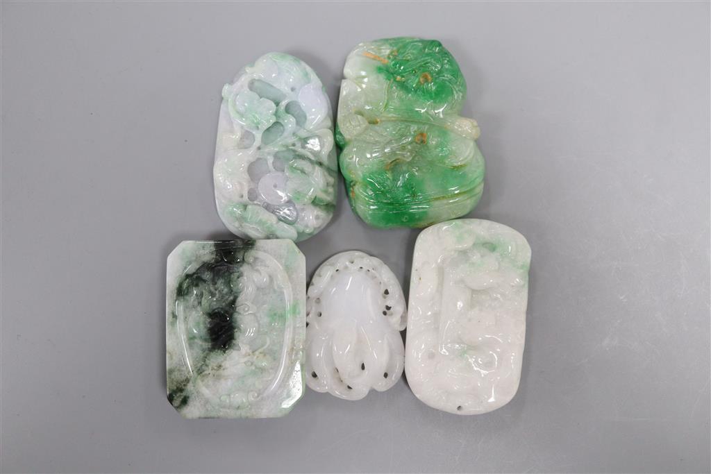 Four Chinese jadeite plaques and a similar belt plaque, 4 - 5.4cm